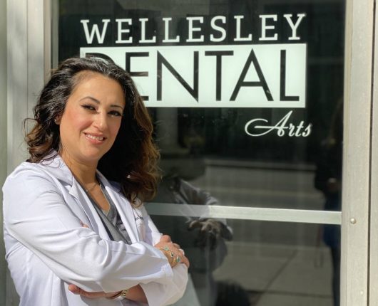 Dr Tania Rohany standing at outside of Wellesley Dental Arts